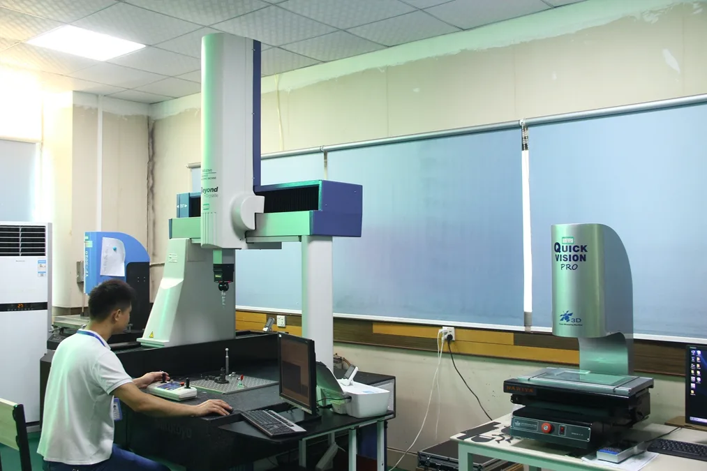 Quality control room with CMM coordinate measuring machine for CNC machined parts inspection
