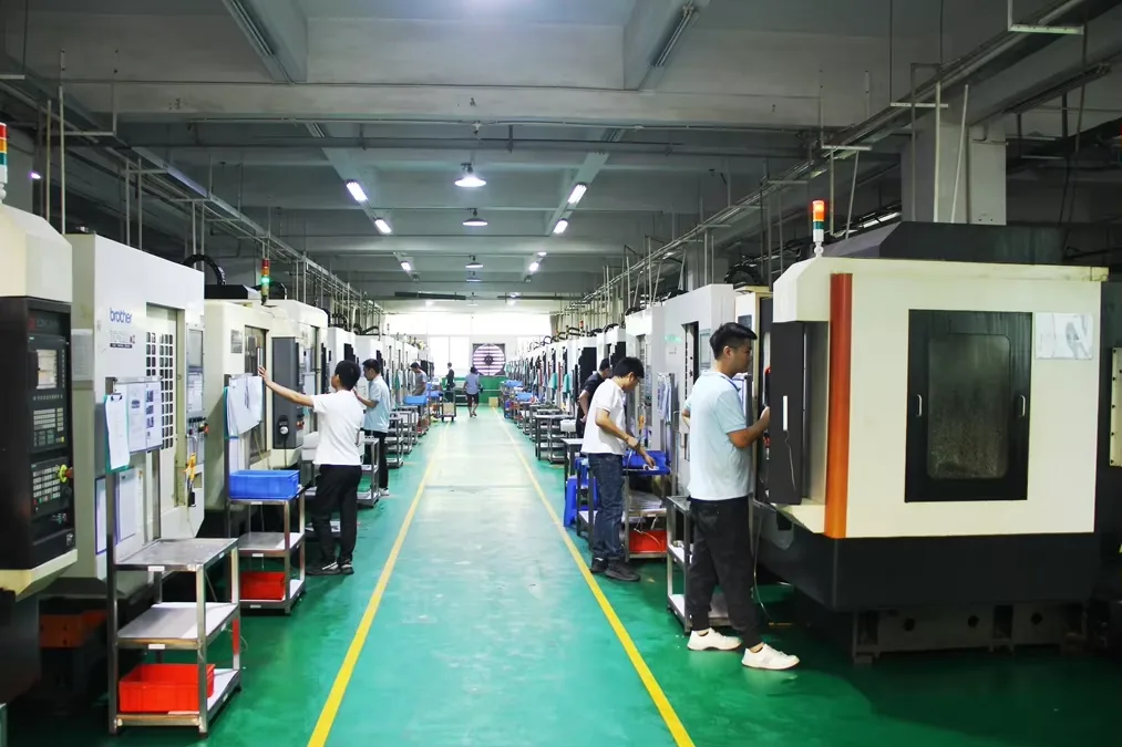 CNC machining workshop with rows of CNC machining centers in Dongguan, China