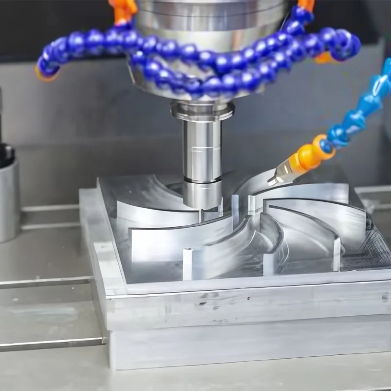 CNC machining center milling an aluminum part